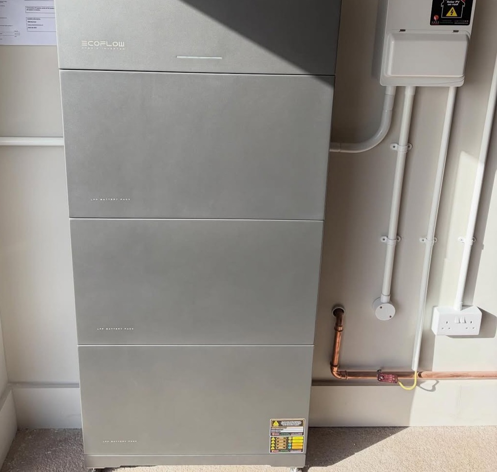 PowerOcean battery stack at a real installation (installer photo, cropped).