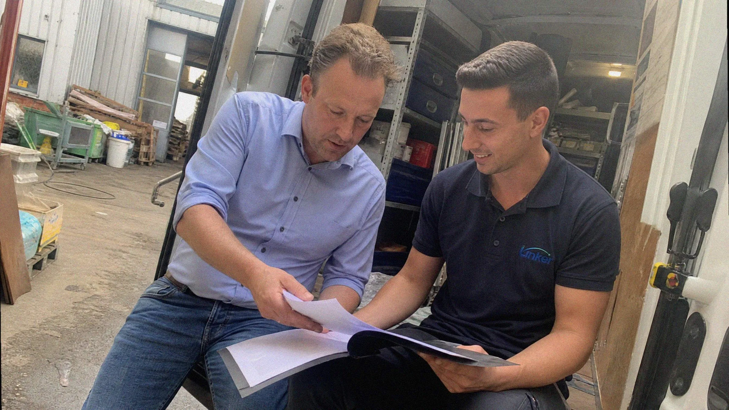 Customer and Linker working through a project at the workshop
